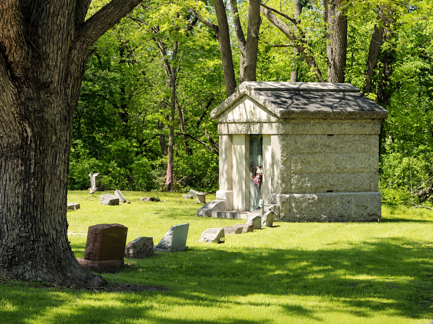 The Lewis family mausoleum framed by mature trees