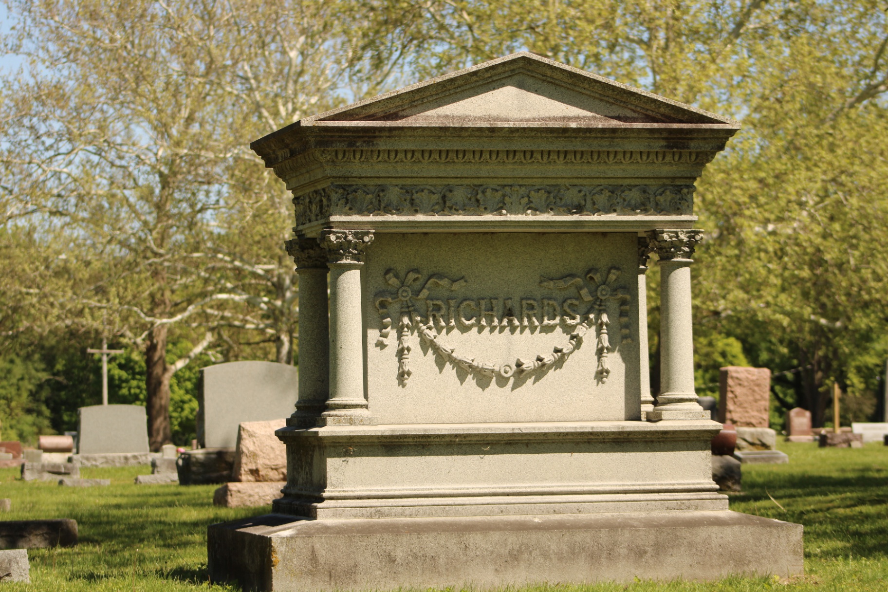 The Richards family monument with Corinthian columns and carved swag detail